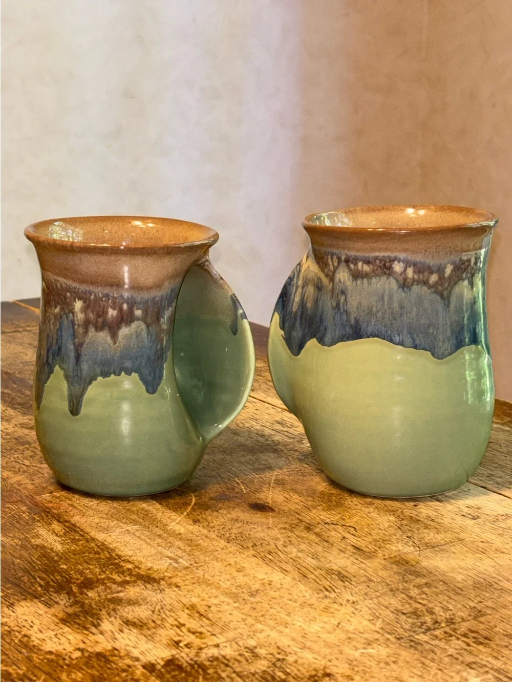 2013 & 2017 Neher Clay in Motion Mossy Creek Pottery Hand Warmer Mugs - Set of 2